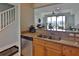 Modern kitchen with stainless steel appliances and granite countertops at 549 Bahia Beach Blvd, Ruskin, FL 33570