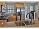 Modern kitchen with stainless steel appliances and granite countertops at 549 Bahia Beach Blvd, Ruskin, FL 33570