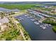 Aerial view of waterfront property with boat slips and marina at 549 Bahia Beach Blvd, Ruskin, FL 33570