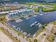 Aerial view of waterfront property with boat slips and marina at 549 Bahia Beach Blvd, Ruskin, FL 33570