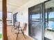 Relaxing deck overlooking water with comfy chairs at 9408 Oak St, Riverview, FL 33578