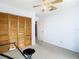 Bedroom with large closet and ceiling fan at 9408 Oak St, Riverview, FL 33578