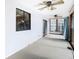 Sunroom with ceiling fans and carpet flooring at 9408 Oak St, Riverview, FL 33578