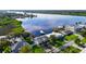 Aerial view showcasing a waterfront home and neighborhood at 9408 Oak St, Riverview, FL 33578