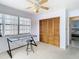 Bedroom with closet, desk, and ceiling fan at 9408 Oak St, Riverview, FL 33578