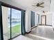 Living area with water views and access to patio at 9408 Oak St, Riverview, FL 33578