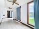 Living room with pool and landscape views at 9408 Oak St, Riverview, FL 33578