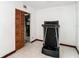 Small exercise room with a treadmill and storage at 9408 Oak St, Riverview, FL 33578