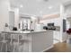 Kitchen with breakfast bar and stainless steel appliances at 35506 Wickingham Ct, Zephyrhills, FL 33541