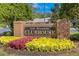 Lake Bernadette Clubhouse entrance sign with landscaping at 35506 Wickingham Ct, Zephyrhills, FL 33541
