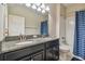 Bathroom with double sinks and granite countertop at 10012 Sage Creek Dr, Ruskin, FL 33573