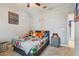 Charming bedroom with a double bed and wall decor at 10012 Sage Creek Dr, Ruskin, FL 33573