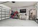 Finished garage with extra storage and mini-fridge at 10012 Sage Creek Dr, Ruskin, FL 33573