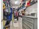 Large walk-in closet with ample shelving and storage at 10012 Sage Creek Dr, Ruskin, FL 33573