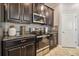 Modern kitchen with stainless steel appliances and granite countertops at 10012 Sage Creek Dr, Ruskin, FL 33573