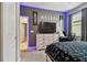 Bright bedroom with a dresser and a TV at 10012 Sage Creek Dr, Ruskin, FL 33573