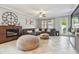Spacious living room with a cozy sectional sofa and a modern fireplace at 10012 Sage Creek Dr, Ruskin, FL 33573