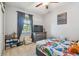 Cozy bedroom with a double bed and lots of toys at 10012 Sage Creek Dr, Ruskin, FL 33573