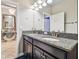 Shared bathroom with double sinks and granite countertop at 10012 Sage Creek Dr, Ruskin, FL 33573
