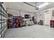 Finished garage with extra storage and mini-fridge at 10012 Sage Creek Dr, Ruskin, FL 33573