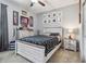 bedroom with a bed and sports memorabilia at 10012 Sage Creek Dr, Ruskin, FL 33573