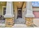 Stone pillars flank the entrance to this charming home at 10012 Sage Creek Dr, Ruskin, FL 33573