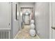 Elegant hallway with tile flooring and a large vase at 10012 Sage Creek Dr, Ruskin, FL 33573