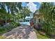 Brick patio walkway leading to a refreshing pool at 1606 Alder Way, Brandon, FL 33510