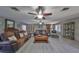 Bright living room featuring hardwood floors and comfy seating at 1606 Alder Way, Brandon, FL 33510