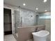 Elegant bathroom featuring a freestanding tub, walk-in shower, and luxurious finishes for a spa-like experience at 4021 W Santiago St, Tampa, FL 33629