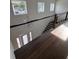 Bright foyer with wood floors and staircase, creating an inviting entrance and highlighting the home's open design at 4021 W Santiago St, Tampa, FL 33629