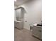 Functional laundry room featuring modern cabinets, a sink, and ample counter space for folding and organizing laundry at 4021 W Santiago St, Tampa, FL 33629