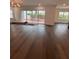 Bright living room features hardwood floors, large sliding doors and natural light at 4021 W Santiago St, Tampa, FL 33629