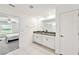 Double vanity bathroom with granite countertop at 13265 Great Plains Dr, Riverview, FL 33579