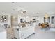 Open concept living and dining area with modern furniture at 13265 Great Plains Dr, Riverview, FL 33579