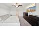 Spacious main bedroom with large TV and dresser at 13265 Great Plains Dr, Riverview, FL 33579