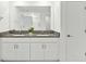 Bathroom with double vanity and granite countertop at 13265 Great Plains Dr, Riverview, FL 33579