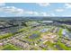 Community overview featuring lakes and a variety of homes at 13265 Great Plains Dr, Riverview, FL 33579