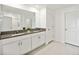 Bathroom with double vanity and granite countertop at 13265 Great Plains Dr, Riverview, FL 33579