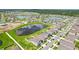 Community overview featuring a lake and numerous houses at 13265 Great Plains Dr, Riverview, FL 33579