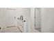 Clean entryway with shoe storage and neutral color scheme at 13265 Great Plains Dr, Riverview, FL 33579