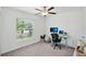 Home office with standing desk and window at 13265 Great Plains Dr, Riverview, FL 33579