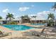 Community pool area with multiple pools and lounge chairs at 13265 Great Plains Dr, Riverview, FL 33579