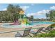 Community waterpark with slides and spray features at 13265 Great Plains Dr, Riverview, FL 33579