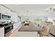 Open concept kitchen with a large island and seating area at 13265 Great Plains Dr, Riverview, FL 33579