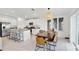 Spacious kitchen with an island, stainless steel appliances and white cabinets at 13265 Great Plains Dr, Riverview, FL 33579