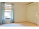 Bedroom with a standard closet, a window with curtains and carpeted flooring at 11416 Billingham Blvd, Spring Hill, FL 34609