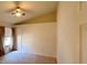 Bright bedroom with ceiling fan and window at 11416 Billingham Blvd, Spring Hill, FL 34609