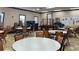 View of the tables and chairs in the community clubhouse at 11416 Billingham Blvd, Spring Hill, FL 34609