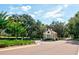 Gated community entrance with guard house at 11416 Billingham Blvd, Spring Hill, FL 34609